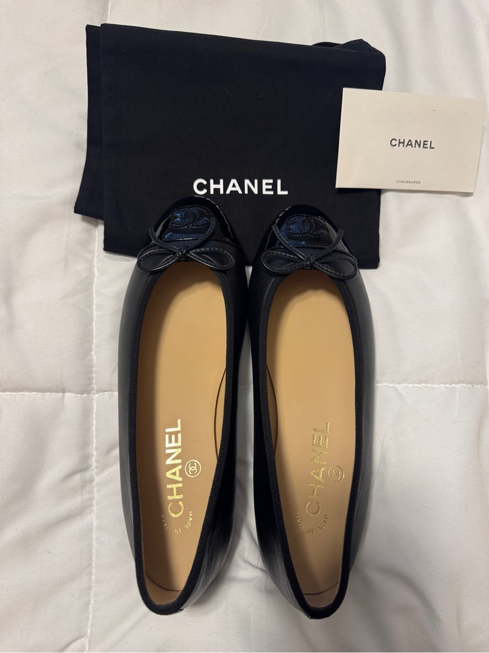 CHANEL Black Leather Flats with Bow Detail